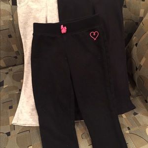 A lot of three pairs of soft pants for girls